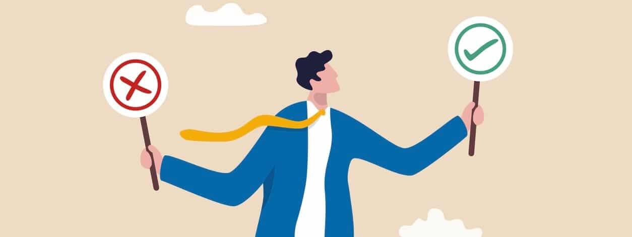 A person in a blue suit with a yellow ribbon on his backDescription automatically generated